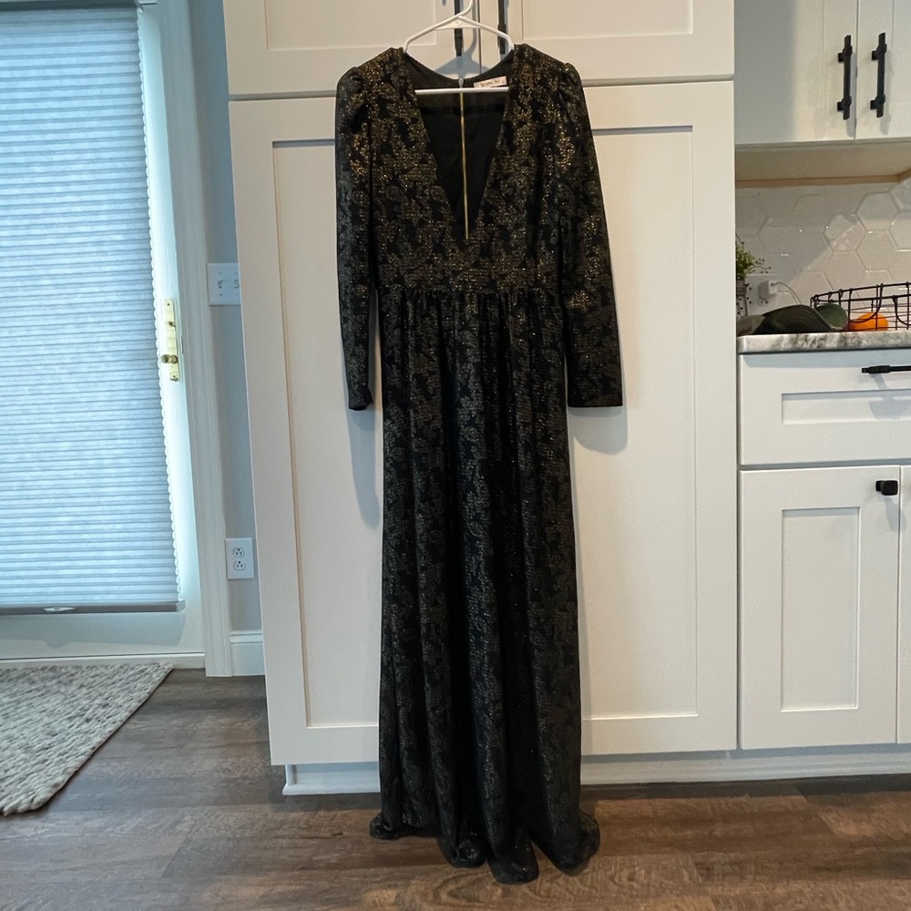 Long sleeve black and gold dress